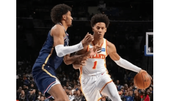 Johnson teki uransa ennätyksen ja johdatti Hawksin voittoon kahdesta jatkoajasta